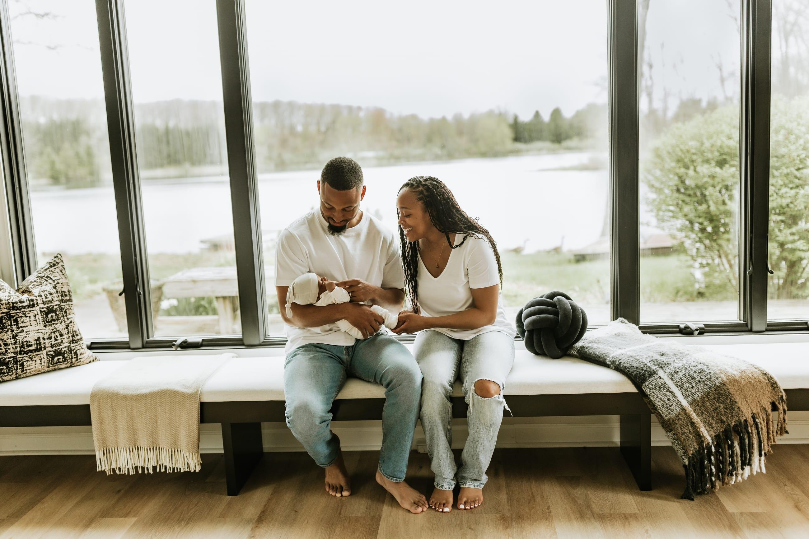 The family at home on Promise View Acres, overlooking the water